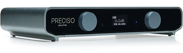 Preciso from the front left: a dark grey case with two knobs and a small display.